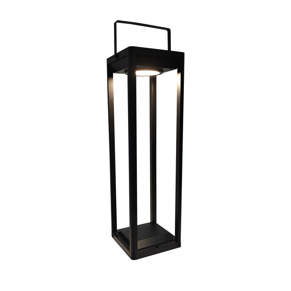 ASTER farol solar LED negro con asa superior y luz cálida encendida, fondo blanco