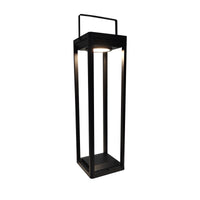 ASTER farol solar LED negro con asa superior y luz cálida encendida, fondo blanco