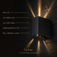 BANNOR encendido en muro de piedra oscura: LED 11 W, 3000 K, luz arriba y abajo, ángulo 50°–87°, IP54