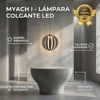 MYACH I esfera de láminas negras encendida sobre mesa de concreto